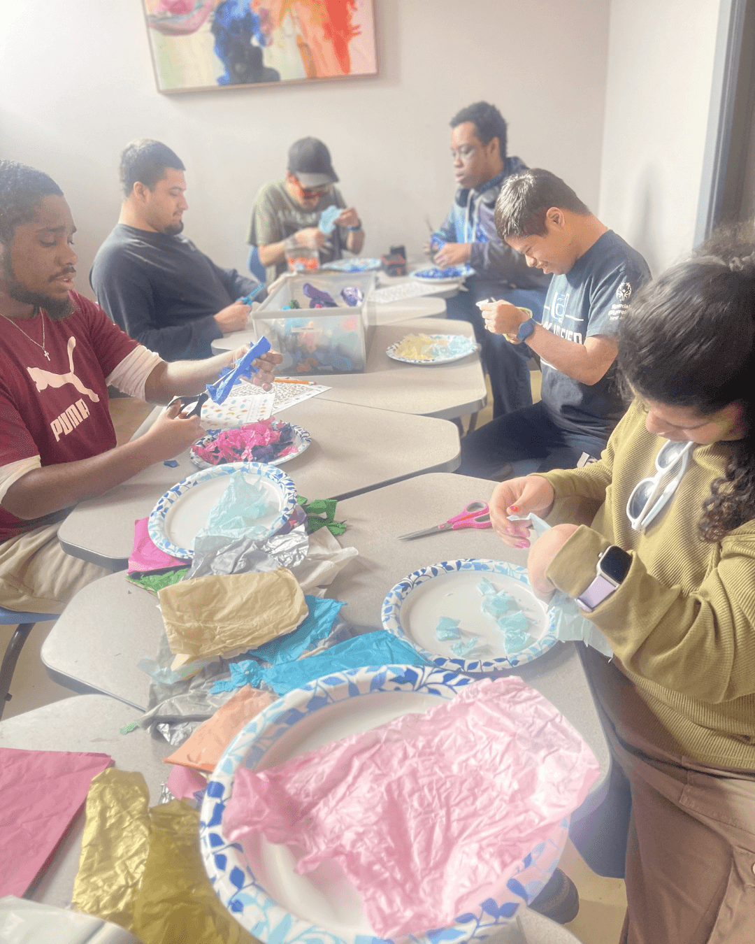 A child and caregiver during a movement activity at an ASun Star center