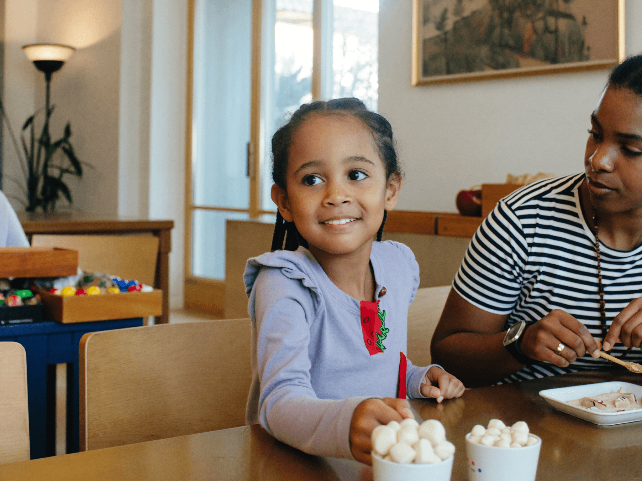A smiling child during an ASun Star enrichment activity