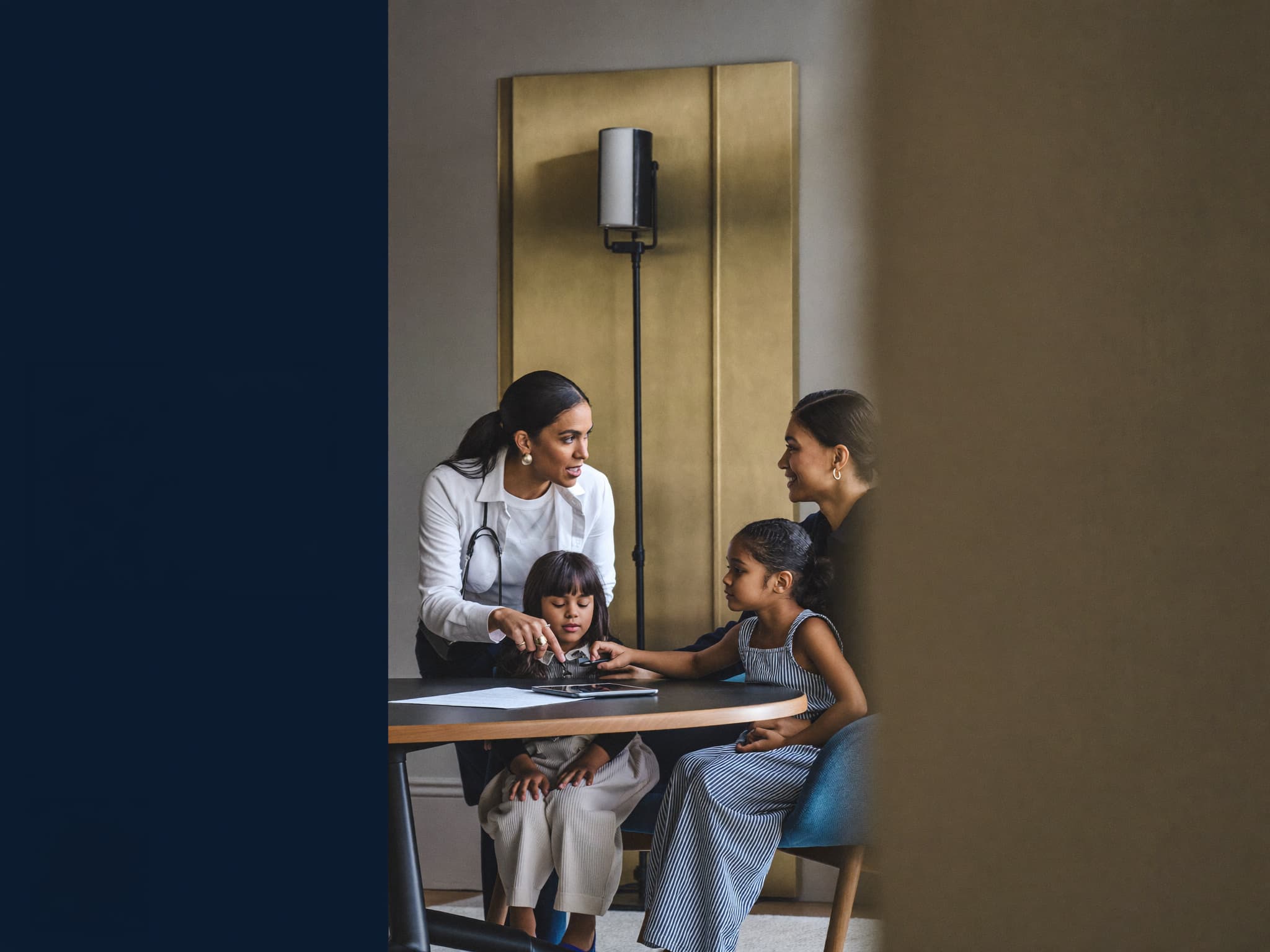 A clinician consulting with a family