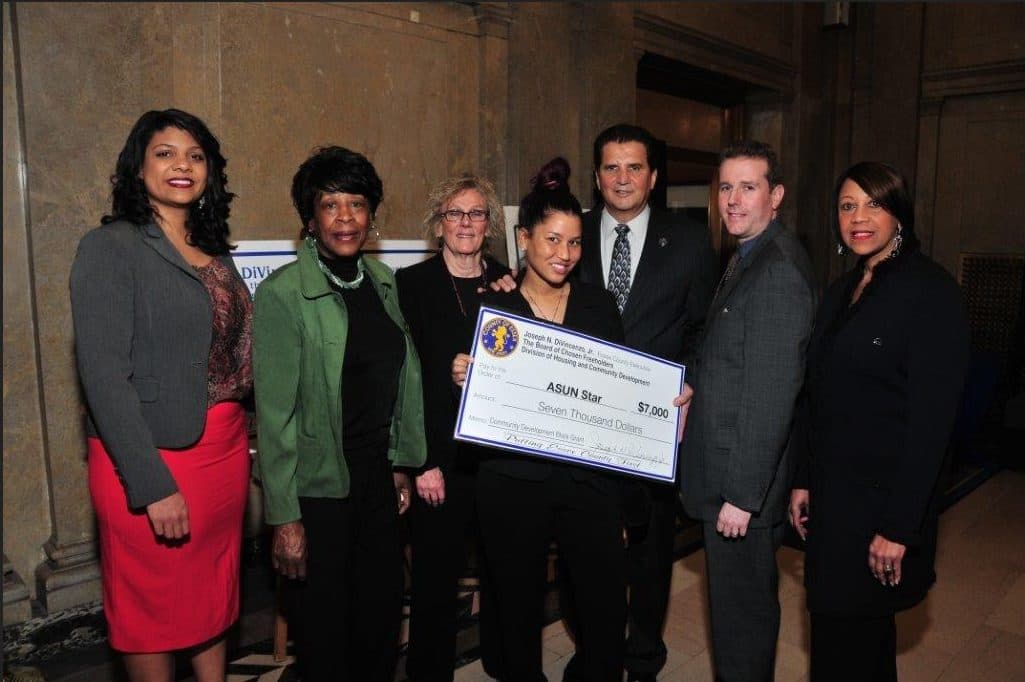ASun Star receiving a grant award