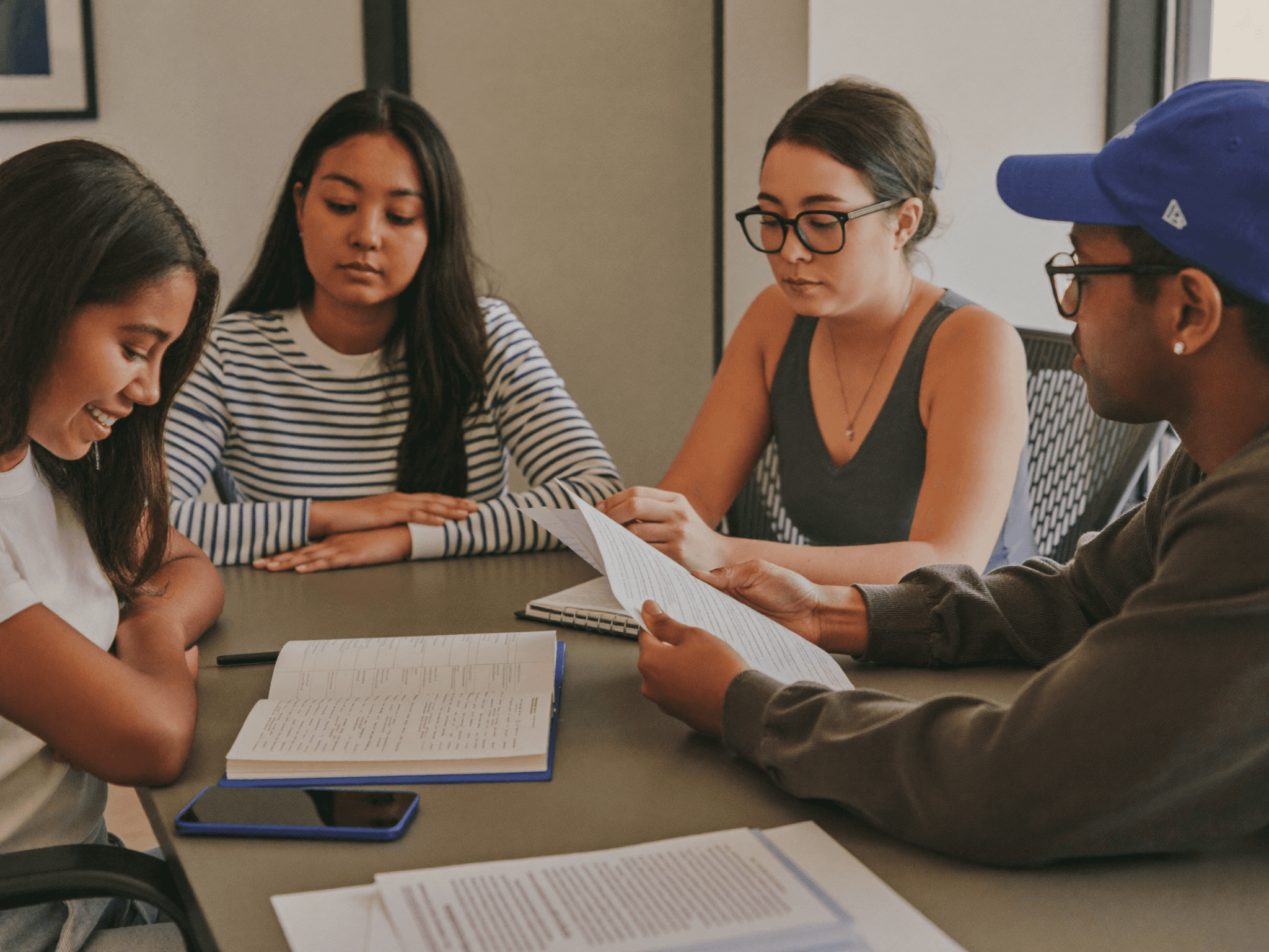 Student interns reviewing documents together